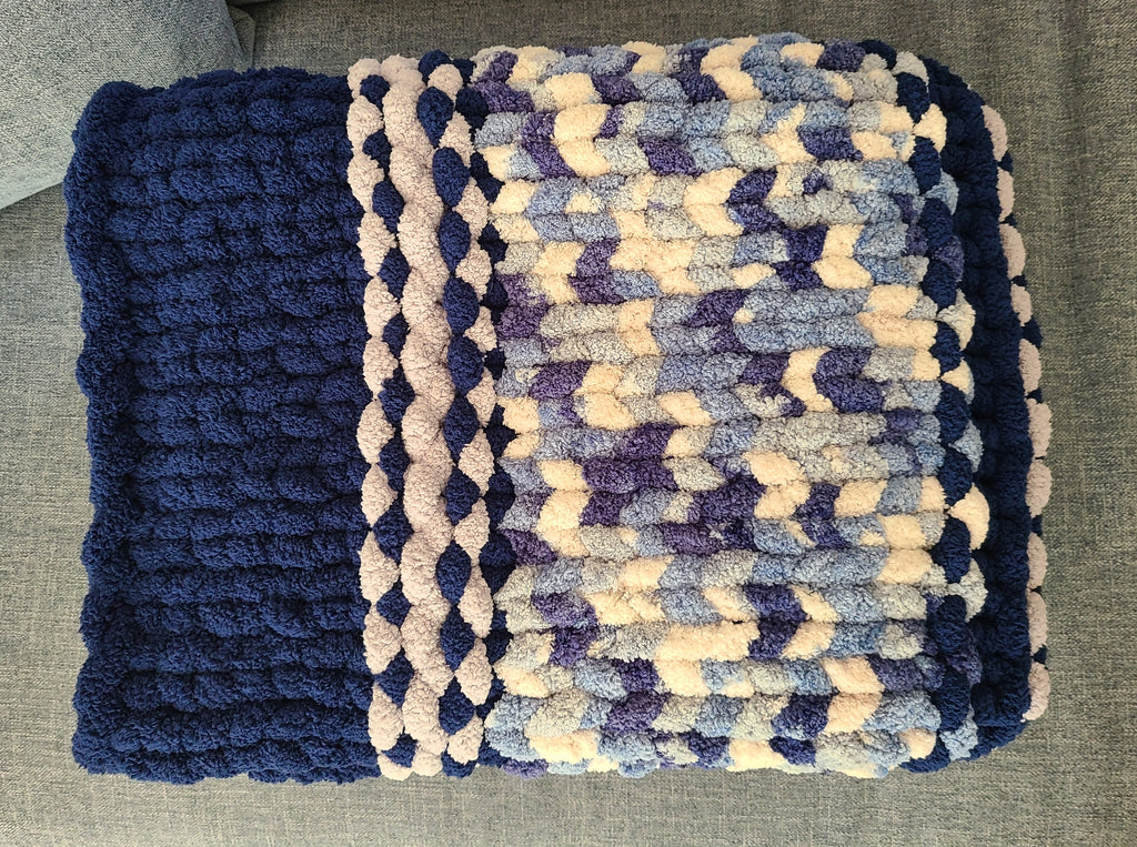 Winter Solstice — deep navy, light gray, and cream — close view of the mottled blue and cream bands