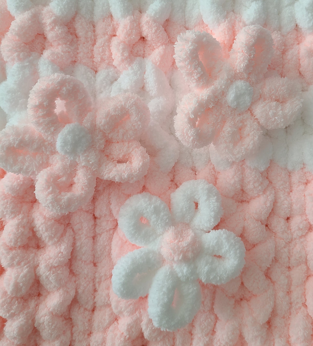 Blushing Mist baby blanket — white and soft pink — macro of the white 3D flowers and diamond stitch