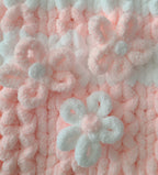 Blushing Mist baby blanket — white and soft pink — macro of the white 3D flowers and diamond stitch