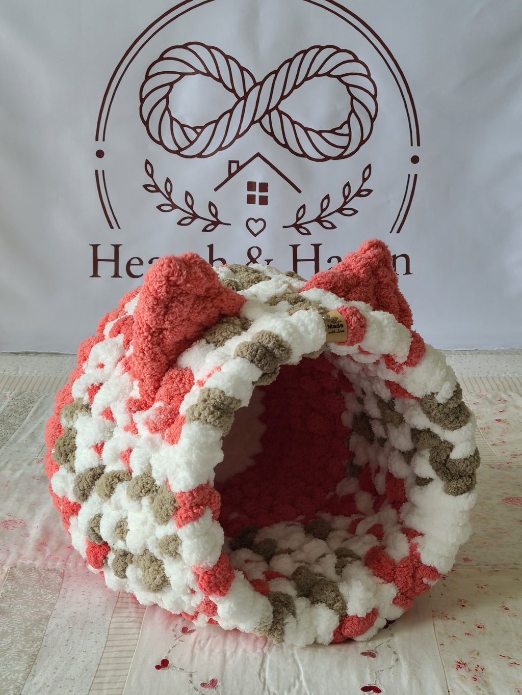 Snuggle Pod in Desert Rose — coral, cream and olive chenille — angled view showing the domed entrance