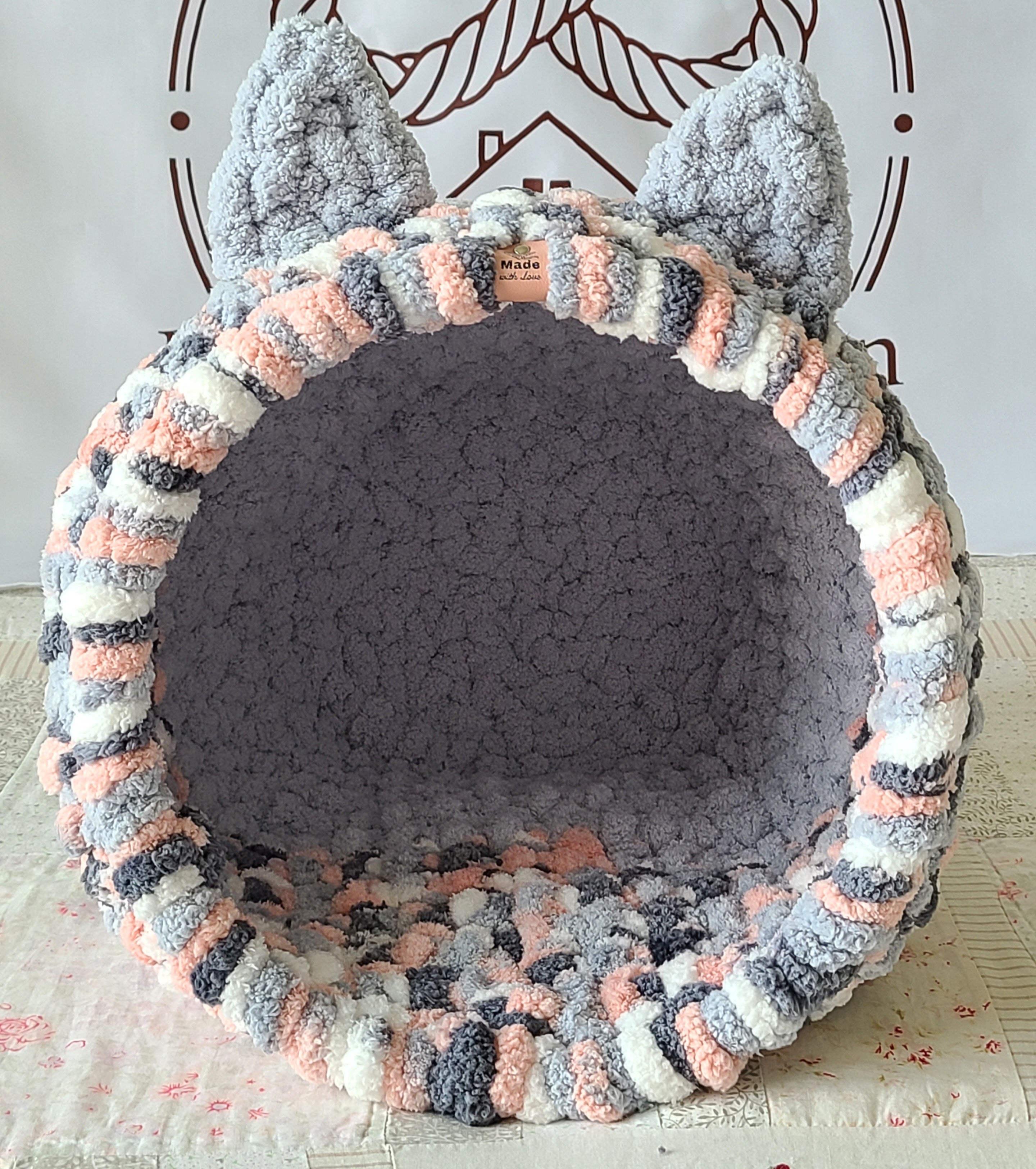Snuggle Pod in Foggy Pink — blush, grey and navy chenille — front view with a soft grey cushioned floor