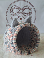 Snuggle Pod in Foggy Pink — blush, grey and navy chenille — angled view showing the domed entrance
