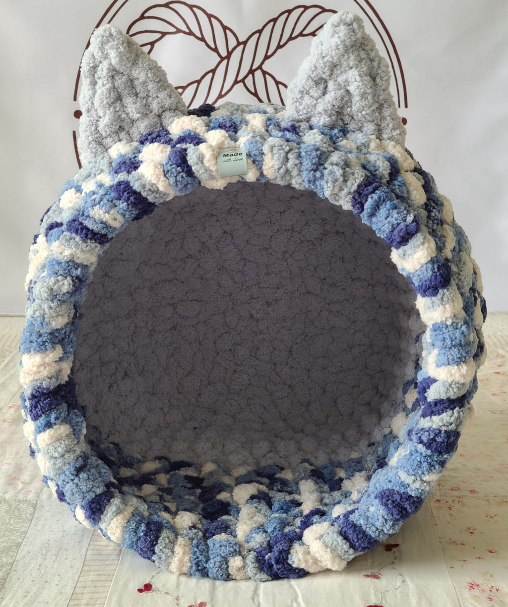 Snuggle Pod in Glacier Blue — navy, blue and cream chenille — front view with a soft grey cushioned floor