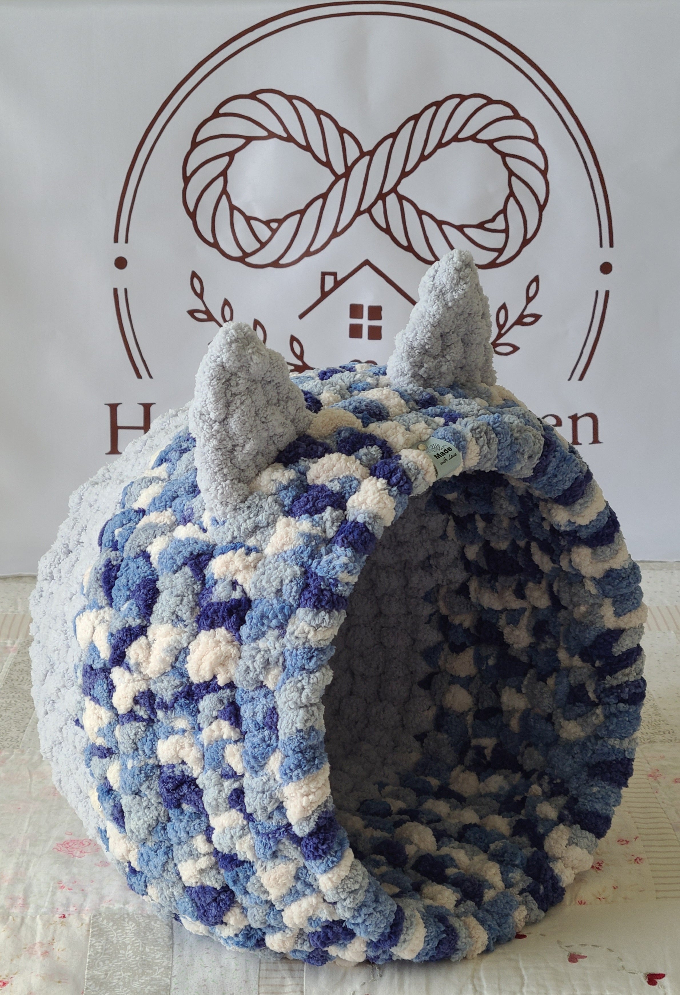 Snuggle Pod in Glacier Blue — navy, blue and cream chenille — angled view showing the domed entrance