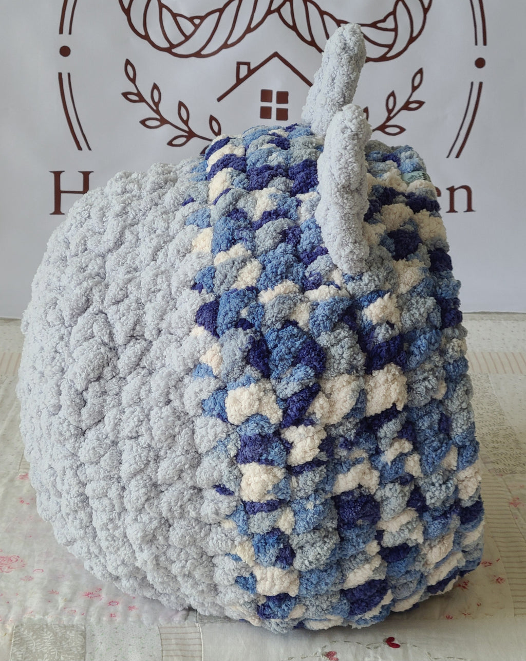 Snuggle Pod in Glacier Blue — navy and cream chenille — side view showing the knit ears