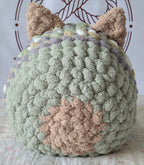 Snuggle Pod in Meadow Green — sage chenille with a peach panel — back view of the domed shell