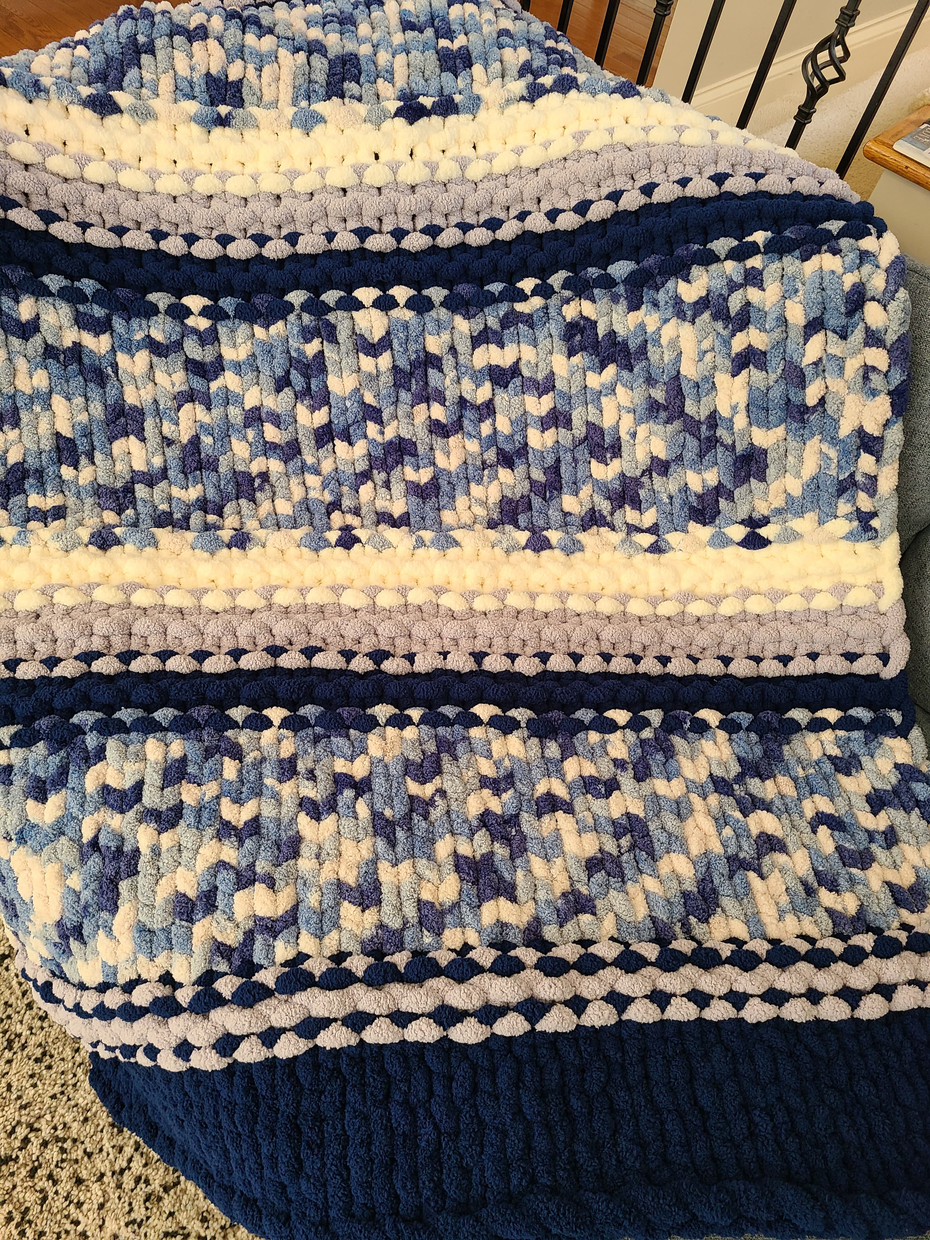 Winter Solstice — deep navy, light gray, and cream — close-up of the variegated blue stripe bands