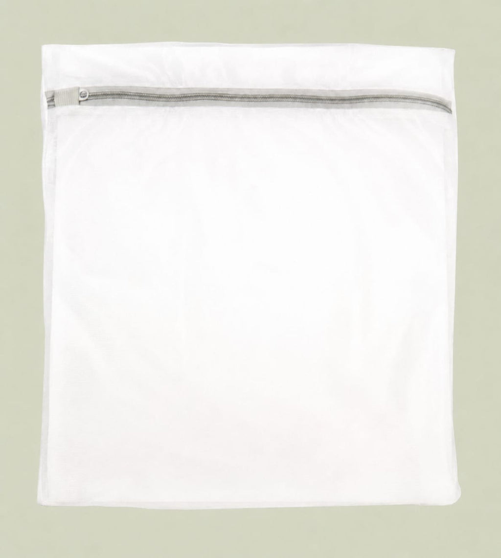 Mesh wash bag — folded flat, zipper closed