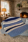 Midnight Meridian — navy, country blue, and ivory herringbone — styled on a home office chair